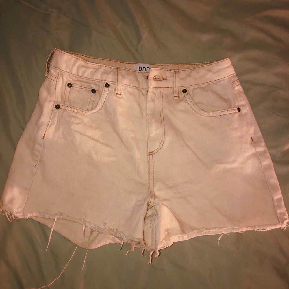 High waisted cream colored shorts